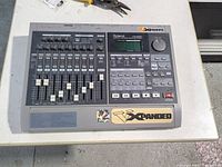 Front/top view showing controls, faders and model label