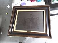 Full view of framed Santa Maria wire artwork