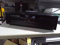 Front view of Sony 5-disc CD player, closed