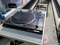 Front view of Technics SL-BD21 turntable on table