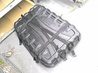 Top view of black Thule hard case showing molded design and exterior straps