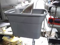 Grey tote with items inside