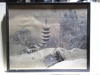 Framed silk painting showing pagoda, cottage and snow-covered hillside