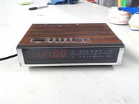 Front view showing LED display and case