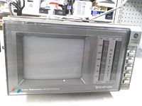 Front view showing screen, tuning scale, controls and GE branding