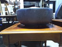 Side view of the wide heavy planter on table