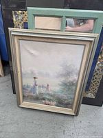 Misty landscape and background frames visible