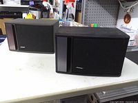 Front view of both Bose 141 speakers
