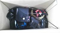 Top view of box showing assorted RC transmitters