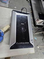 Top view of Canon CanoScan 8800F scanner showing brand and control panel
