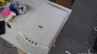 Top view of Compaq S4100 scanner showing overall exterior and control buttons