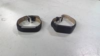 Both Fitbit trackers top view