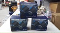 Front view of three Jounivo USB microphone boxes