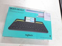 Retail box showing Logitech K480 Multi-Device keyboard image, branding, compatibility icons