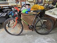 Full left side view of Magna Great Divide bicycle showing frame, wheels, handlebars and overall condition