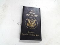 Closed album showing cover text and emblem