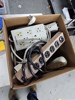 Top-down view of box showing multiple power strips