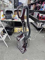 Full view of Shark upright vacuum showing overall design, colour and components
