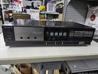 Front view showing control layout and branding