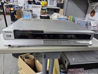 Front view of Technics SL-PJ2 CD player showing controls, display and headphone jack