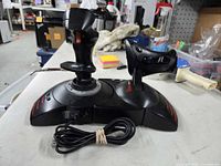 Front right view of joystick and throttle set with USB cable