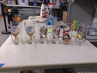 Front view of all six glasses in lot