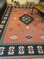 Overall view of rug showing pattern and colours