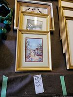 Stack of three gold-framed pieces showing sizes and styles
