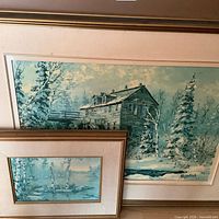 Both framed Keirstead prints, one large mill scene behind smaller birch scene
