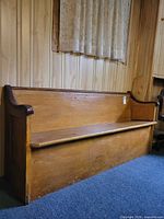 full view of church pew bench against wall