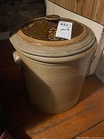 Crock with lid view showing overall form and lid