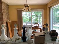 front view of decanters, vases and multicolour vase