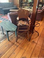 All three items together: coat rack, high chair, green stool