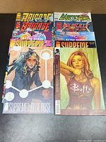 Front view showing Supreme: Blue Rose, Buffy, Brigade, WildC.A.T.s and others