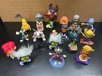 Full group shot of all 17 figurines laid out