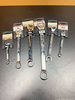 Front view of all six wrenches in packaging