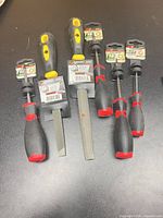 All six tools laid out showing handles and packaging