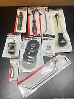 Full group shot of nine packaged Performance Tool items