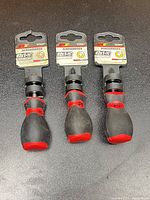 Three PT stubby Phillips screwdrivers front view
