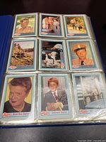 Nine Andy Griffith Show cards in plastic page, binder visible