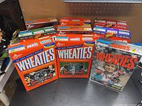 Group shot showing all nine Wheaties NFL boxes
