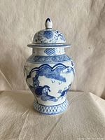 Front view of blue and white porcelain ginger jar with lid