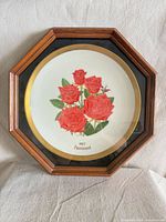 Front view of framed Gorham rose plate