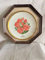 Front view of framed Gorham Double Delight plate