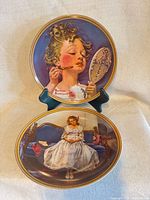 Both porcelain plates front view on stand