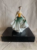Front view of Royal Doulton Cynthia figurine on stand