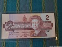 Front view of single 1986 $2 banknote