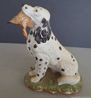 Left side view of porcelain English Setter figurine showing spots and base