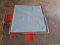 Top view showing square table surface, side drawers and holders