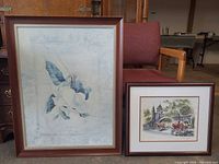 Both framed prints side by side showing size comparison and frames